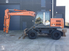 Pelle sur pneus Hitachi ZX140W-3