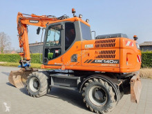 Doosan DX140 W pelle sur pneus occasion
