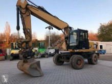 Caterpillar 318 D használt lánctalpas kotrógép
