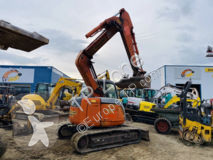 جرافة New Holland e70sr double déport de bras جرافة مجنزرة مستعمل