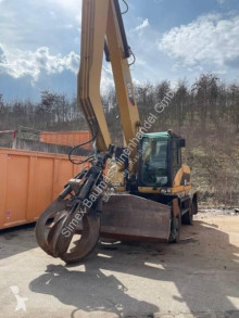 Caterpillar M 318 D MH escavatore per movimentazione usato