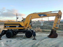Excavadora de ruedas Caterpillar 320 M