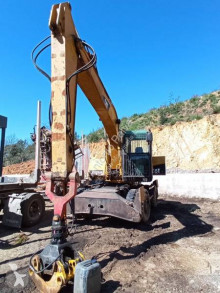 جرافة Caterpillar M316 جرافة على عجلات مستعمل