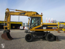 جرافة Caterpillar M 318 جرافة على عجلات مستعمل