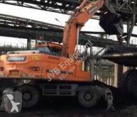 Doosan DX210 W excavadora de ruedas usada