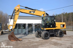 Caterpillar M318D pelle sur pneus occasion