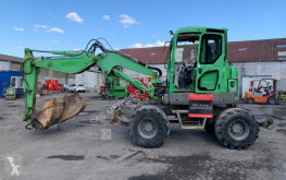 escavatore gommato usato