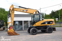 Pelle sur pneus Caterpillar M318 D