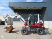 Takeuchi TB295W (powertilt) pelle sur pneus occasion