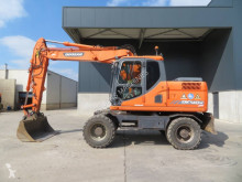 Excavadora Doosan DX 140 W excavadora de ruedas usada