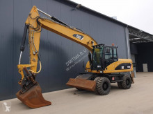 Pelle sur pneus Caterpillar M318D