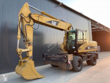 Caterpillar M322 koparka kołowa używana