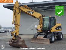 Caterpillar M313 used wheel excavator