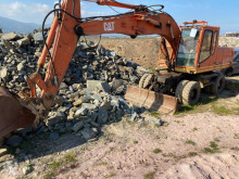 Kolová lopata Caterpillar M318