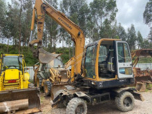 Hyundai R55 W 7 pelle sur pneus occasion