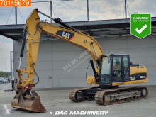 Caterpillar 320D pásová lopata použitý