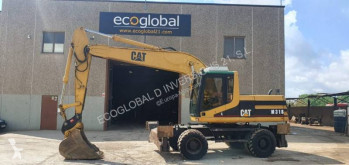 Caterpillar M318 M 318 ***QUICK HITCH*** escavadora de rodas usada