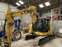 Caterpillar 315 pásová lopata použitý
