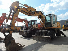 Liebherr A314 pelle sur pneus occasion