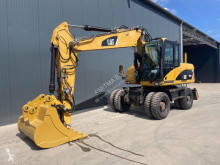 Lastik tekerli kepçe Caterpillar M315