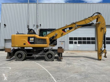 Pelle sur pneus Caterpillar MH3022