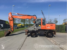 escavatore gommato usato