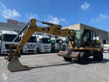 Pelle sur pneus Caterpillar CAT M313D