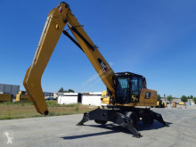 Caterpillar MH3024 pelle sur pneus occasion