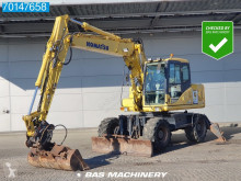 Excavadora Komatsu PW130- 7K BLADE + STAMPS - ALL FUNCTIONS excavadora de ruedas usada