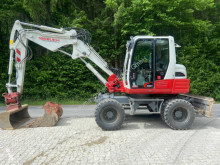 Takeuchi TB295W pelle sur pneus occasion
