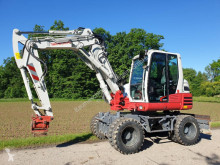 Takeuchi TB295W pelle sur pneus occasion