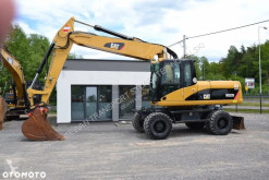 Excavadora Caterpillar M322D excavadora de ruedas usada
