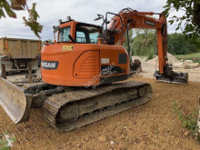 Doosan DX140 LC escavadora de lagartas usada
