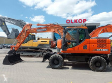 Doosan DX140 W pelle sur pneus occasion