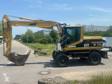 Caterpillar M315 escavatore gommato usato