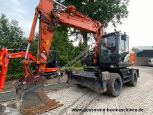 جرافة Hitachi ZX 140 W-6 جرافة على عجلات مستعمل