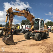Liebherr A316 pelle sur pneus occasion
