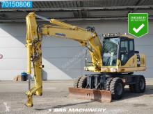 Komatsu PW160 tweedehands graafmachine op banden