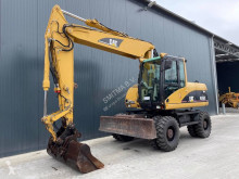 جرافة Caterpillar M316 جرافة على عجلات مستعمل