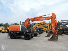 Hitachi ZX190W használt gumiabroncsos kotrógép