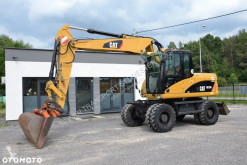 Excavadora Caterpillar M313D excavadora de ruedas usada