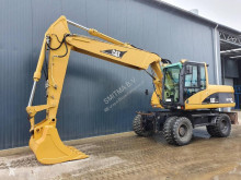 Caterpillar M318C gravemaskine på hjul brugt