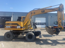 Rýpadlo Caterpillar M312 kolesové rýpadlo ojazdený