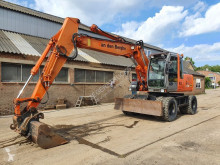 Hitachi ZX130W escavatore gommato usato