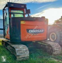 Doosan DX140 LCR pelle sur pneus occasion