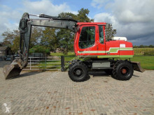 Liebherr A 314 Litronic bandenkraan tweedehands graafmachine op banden