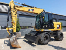 Lastik tekerli kepçe Caterpillar M313D VAH