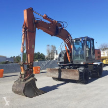 Hitachi ZX140W-3 pelle sur pneus occasion