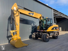 Caterpillar M318D pelle sur pneus occasion
