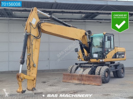 Caterpillar M322 D gravemaskine på hjul brugt